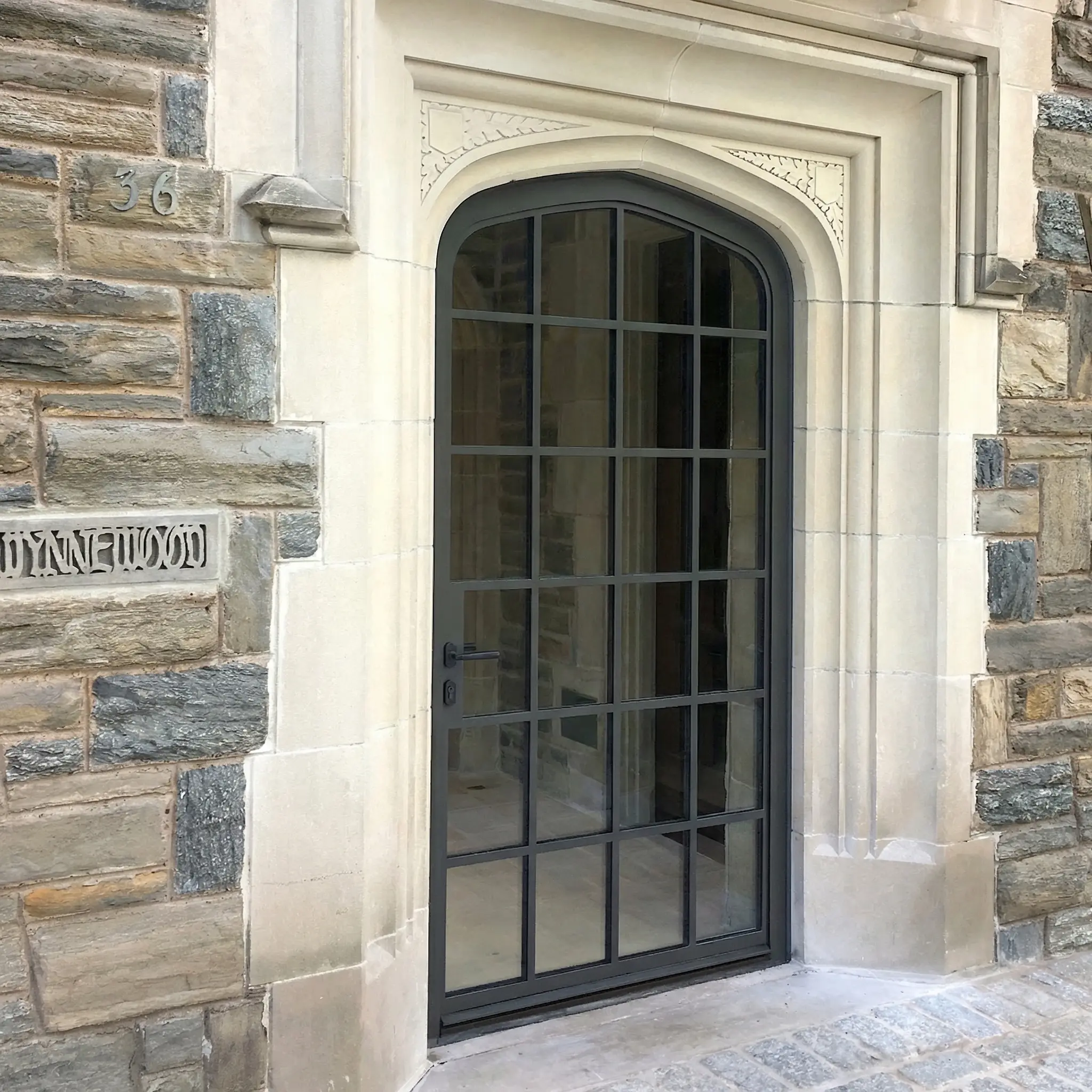 Thermal Stainless Steel Entry door with powder coat finish, SDL muntins, high performance insulating glass
