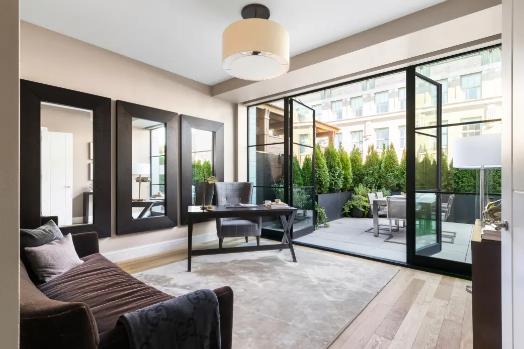 Thermal Stainless Steel French door pair with fixed sidelites, powder coat finish, SDL muntins, low profile threshold, high performance insulating glass